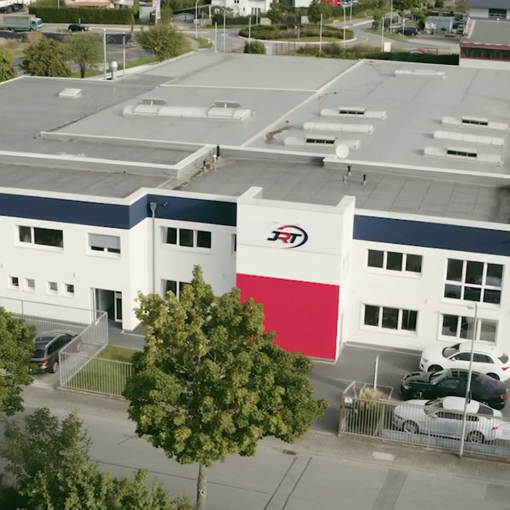 Werk Einhausen aus der Luft mit dem Schild von JRT Elastomertec